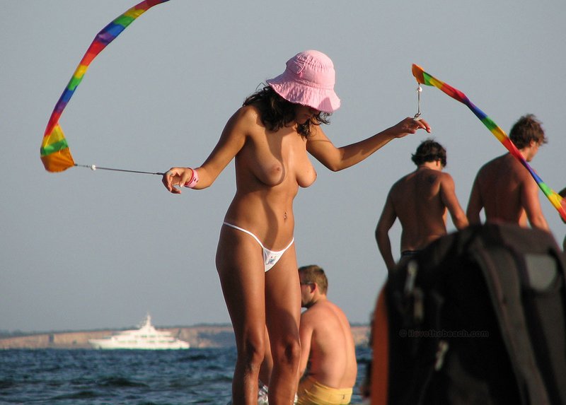 girl flashing tits at the beach