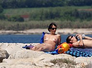 Young nudism family boys