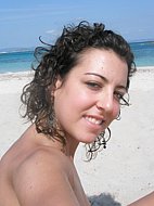 Lovely teens bare their bodies at a nudist beach